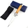 Italian Stiletto Switchblade Yello Pearl Resin Button 1.1.webp